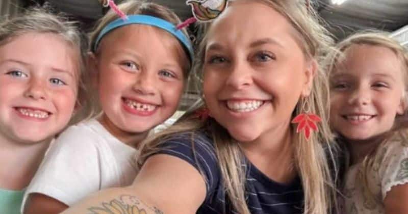 Teacher styling student's hair as a daily morning routine
