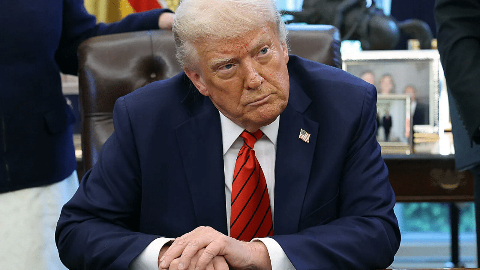 President Trump seated at a table during a policy discussion