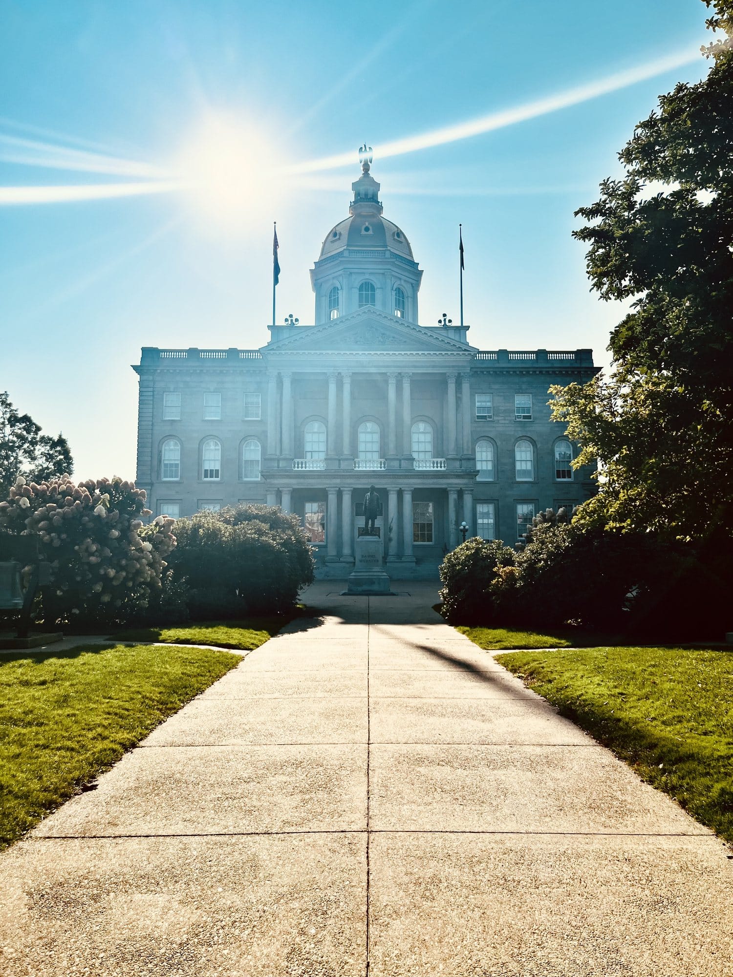 New Hampshire Requires Play in Kindergarten. Teachers Say Benchmarks Are Squeezing It Out. 1 The gold-domed New Hampshire State House in Concord, seen down a walkway on a sunny day