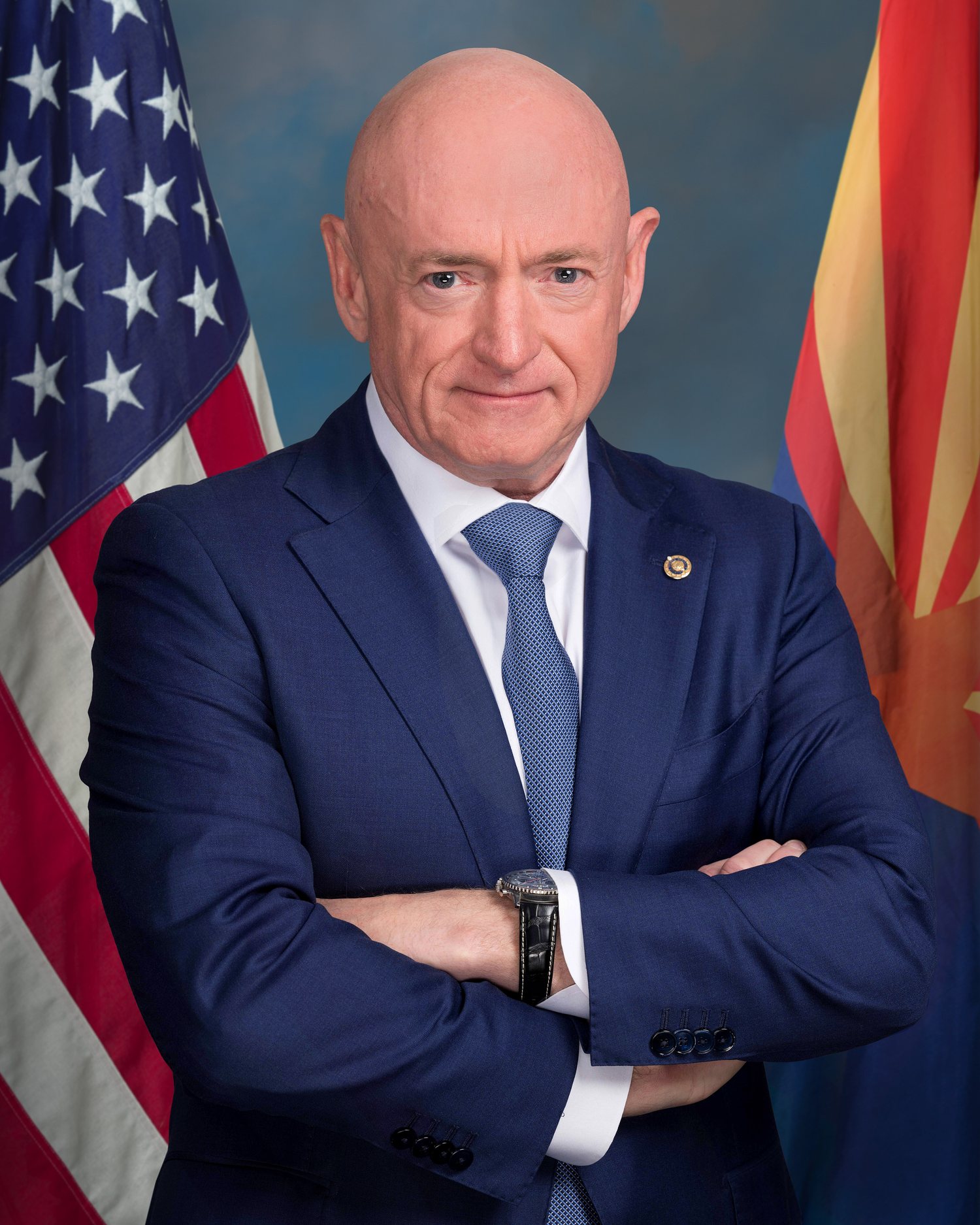 A Senate Bill Would Pay States to Ban Phones in Every Public School. Here's What It Actually Requires. 1 Official portrait of U.S. Sen. Mark Kelly of Arizona in front of the U.S. and Arizona flags